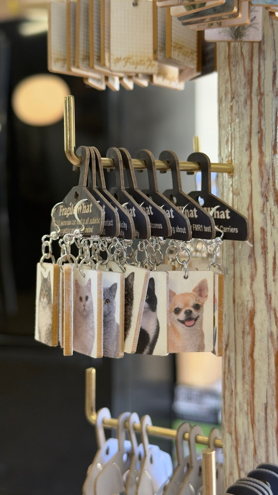 Fragile What spinner display loaded with earrings
