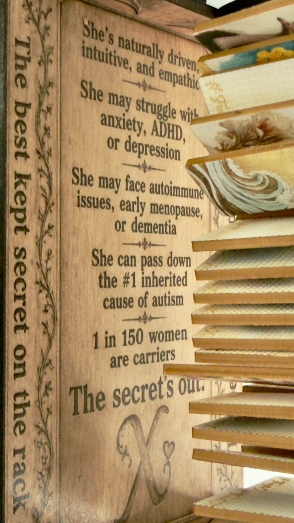 Engraved text on the Fragile What small rack display
