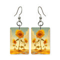 Golden trio earrings — three golden blooms together, cut-paper art, made in USA