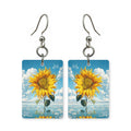 Cloud bloom earrings — flowers formed from soft cloud shapes, cut-paper art, made in USA
