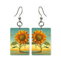 Sunset bloom earrings — flowers lit in sunset orange and pink, cut-paper art, made in USA