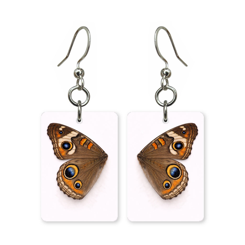 Common buckeye earrings — brown butterfly wing with ringed eyespots, cut-paper art, made in USA