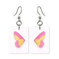 Rosy wing earrings — butterfly wings washed in rose pink, cut-paper art, made in USA