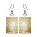 Golden wheatfield earrings — gold wheatfield running to the horizon, cut-paper landscape