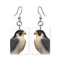 Peregrine falcon earrings — falcon in sharp profile, cut-paper portrait, made in USA
