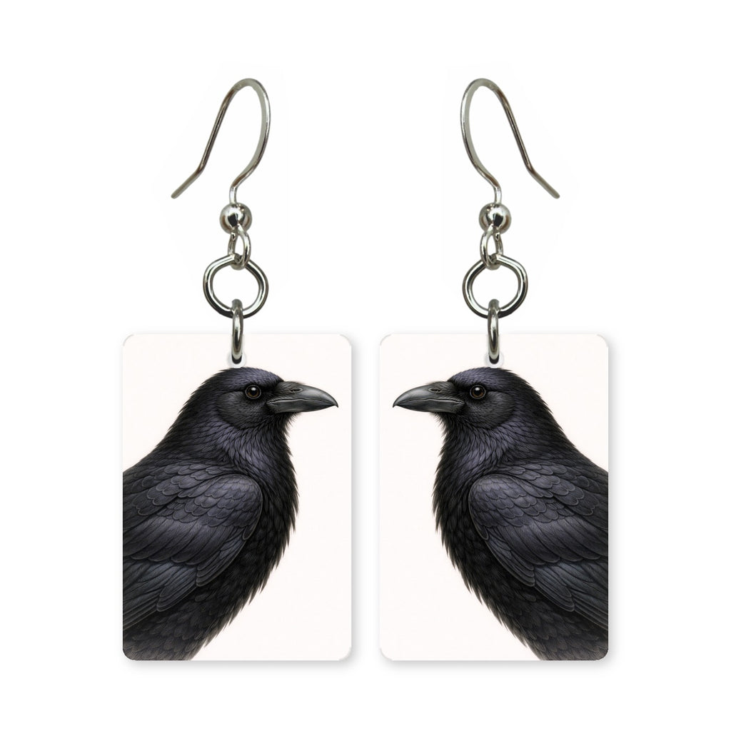 Midnight raven earrings — black raven with oil-slick sheen in cut-paper portrait, made in USA