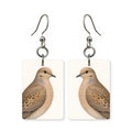 Mourning dove earrings — soft grey dove in cut-paper portrait, made in USA