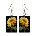 Midnight sunflower earrings — sunflowers on a deep midnight ground, cut-paper art, made in USA