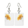Soft sunflower earrings — sunflowers in muted gentle color, cut-paper art, made in USA