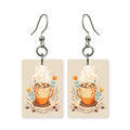 Cozy latte earrings — latte cup with foam art in cut paper, made in USA