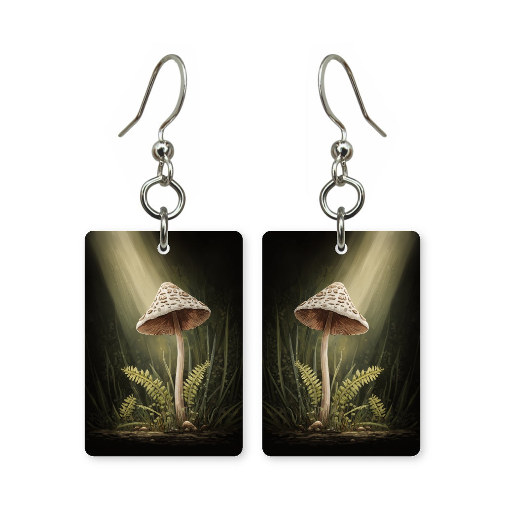 Woodland spotlight earrings — light landing on the forest floor, cut-paper art, made in USA