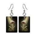 Woodland spotlight earrings — light landing on the forest floor, cut-paper art, made in USA