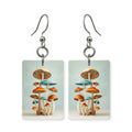 Mushroom stack earrings — mushrooms stacked in a tower, cut-paper art, made in USA