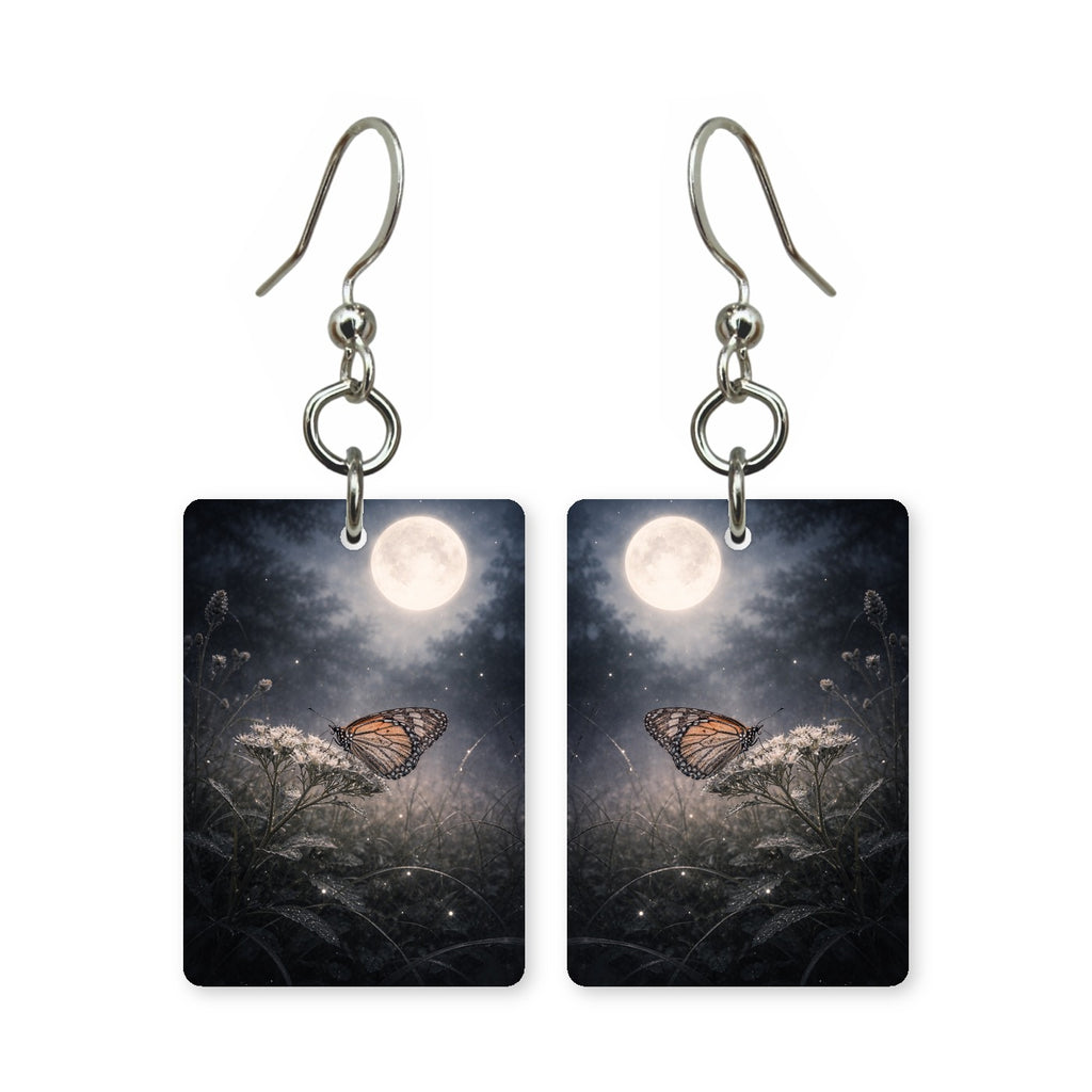 Moonlit monarch earrings — monarch butterfly crossing a full moon, cut-paper art, made in USA