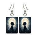 Moongazer silhouette earrings — silhouetted figure looking up at the moon, made in USA