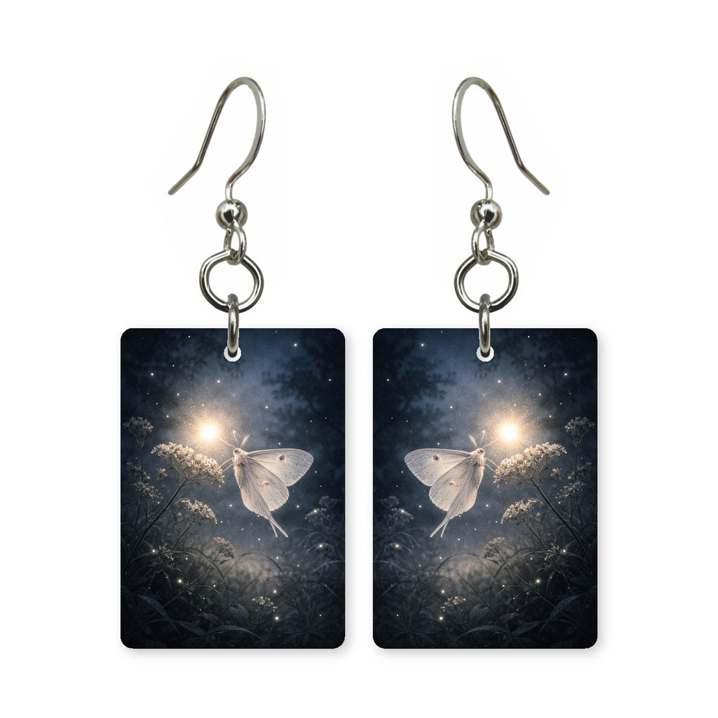 Moonlit moth earrings — moth crossing in front of a full moon, cut-paper art, made in USA