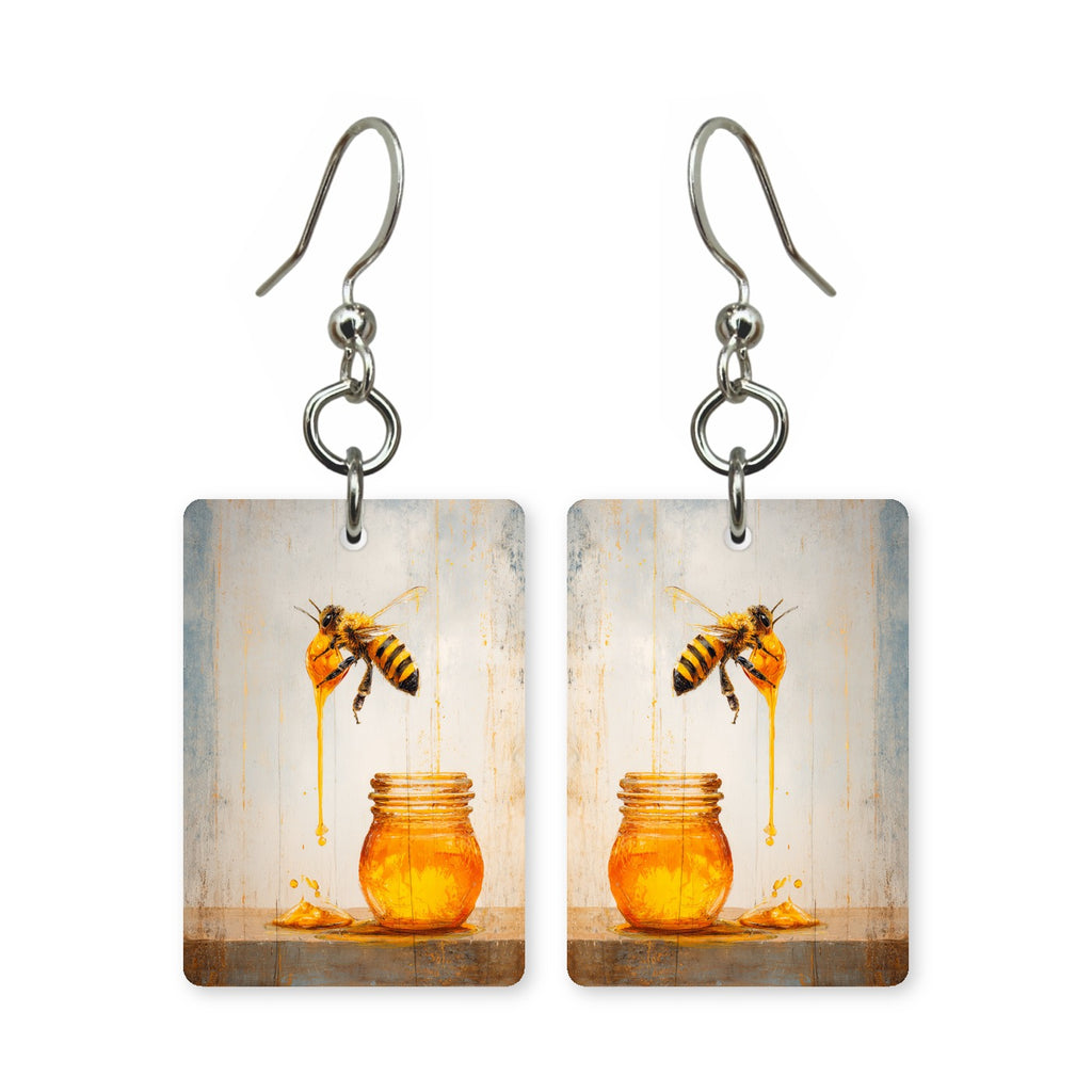 Honey drip bee earrings — bee on a slow drip of honey, cut-paper art, made in USA
