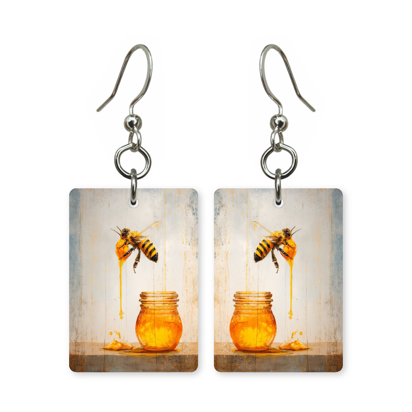 Honey drip bee earrings — bee on a slow drip of honey, cut-paper art, made in USA
