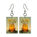 Wildflower honey earrings — honey jar surrounded by wildflower blooms, made in USA