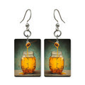 Golden honey drizzle earrings — honey pouring gold off a dipper, made in USA