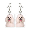White poodle earrings — poodle in full puff coat, cut-paper portrait, made in USA
