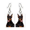 Doberman Pinscher earrings — black and tan Doberman portrait in cut paper, made in USA