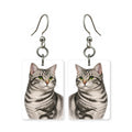 Silver tabby earrings — cool grey banded tabby cat portrait in cut paper, made in USA