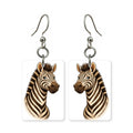 Cartoon zebra earrings — playful striped zebra in cut-paper cartoon style, made in USA