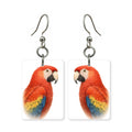 Scarlet macaw earrings — red, blue and gold macaw portrait in cut paper, made in USA