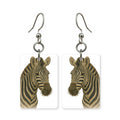 Wild zebra earrings — black and white striped zebra portrait in cut paper, made in USA