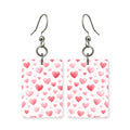 Heart pattern earrings — repeating heart pattern in cut paper, made in USA