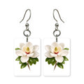 White magnolia earrings — white magnolia blooms on a dark branch, cut-paper art, made in USA