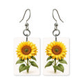 Sunflower stem earrings — single sunflower on a long stem, cut-paper art, made in USA