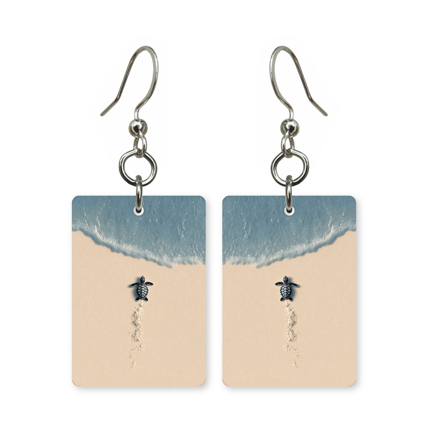 Beach hatchling earrings — baby sea turtle crossing wet sand, cut-paper art, made in USA