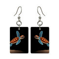 Midnight turtle earrings — sea turtle in deep midnight water, cut-paper art, made in USA