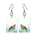 Watercolor turtle earrings — sea turtle in soft watercolor bleed, made in USA