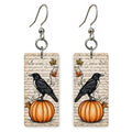 Crow and Pumpkin earrings mockup (mirrored pair)