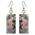 Coral Behind Clenched Teeth Earrings | FWX1141