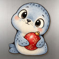 Snowy Seal wood magnet M290 on a stainless steel fridge, made in USA