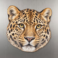 Amur Leopard face wood magnet, shown on stainless steel.