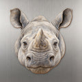 White Rhinoceros face wood magnet, shown on stainless steel.