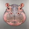 Hippopotamus face wood magnet, shown on stainless steel.