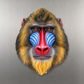 Mandrill face wood magnet, shown on stainless steel.