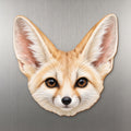Fennec Fox face wood magnet, shown on stainless steel.