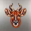 Bongo Antelope face wood magnet, shown on stainless steel.