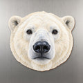 Polar Bear face wood magnet, shown on stainless steel.