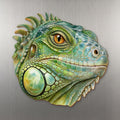 Green Iguana face wood magnet, shown on stainless steel.