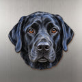 Labrador Retriever face wood magnet, shown on stainless steel.