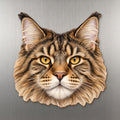 Maine Coon Cat face wood magnet, shown on stainless steel.