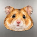 Syrian Hamster face wood magnet, shown on stainless steel.